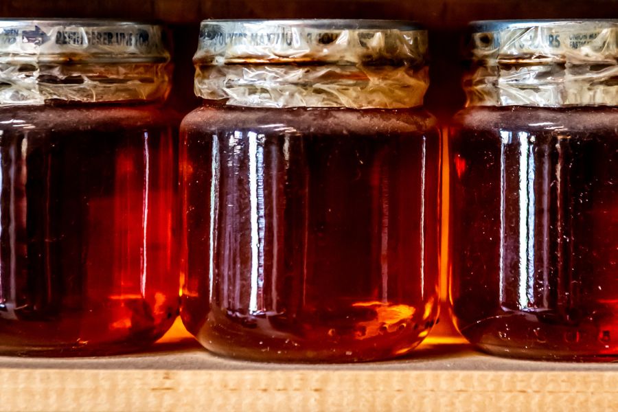 Jars of maple syrup on the sack