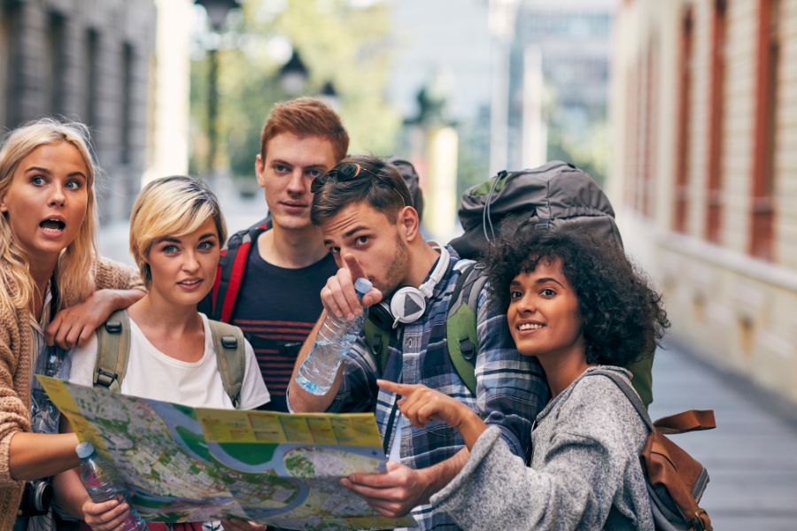 Group of millennial friends traveling together