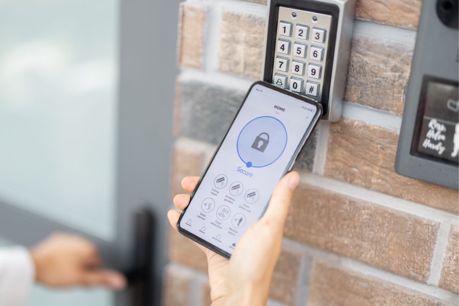 Woman unlocking door using home smart lock system