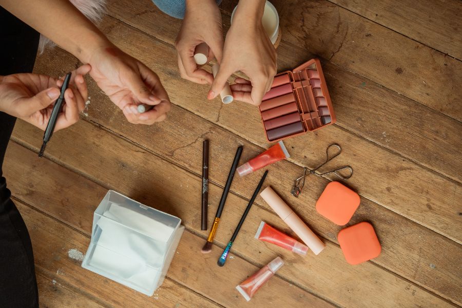 Female hands trying makeup products