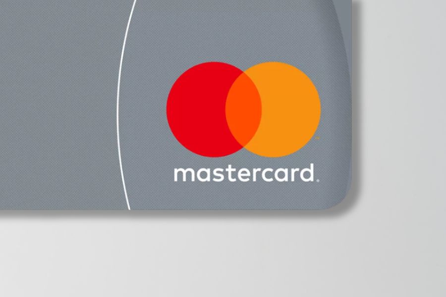 Mastercard credit card on light background